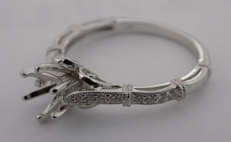 Diamond ribbon motif semi-mount engagement ring