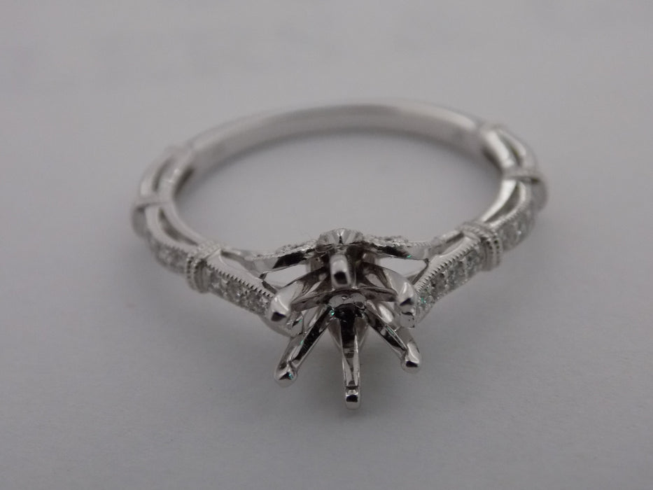 Diamond ribbon motif semi-mount engagement ring