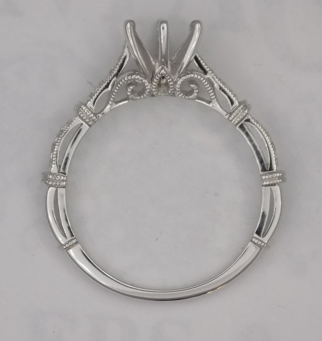 Diamond ribbon motif semi-mount engagement ring