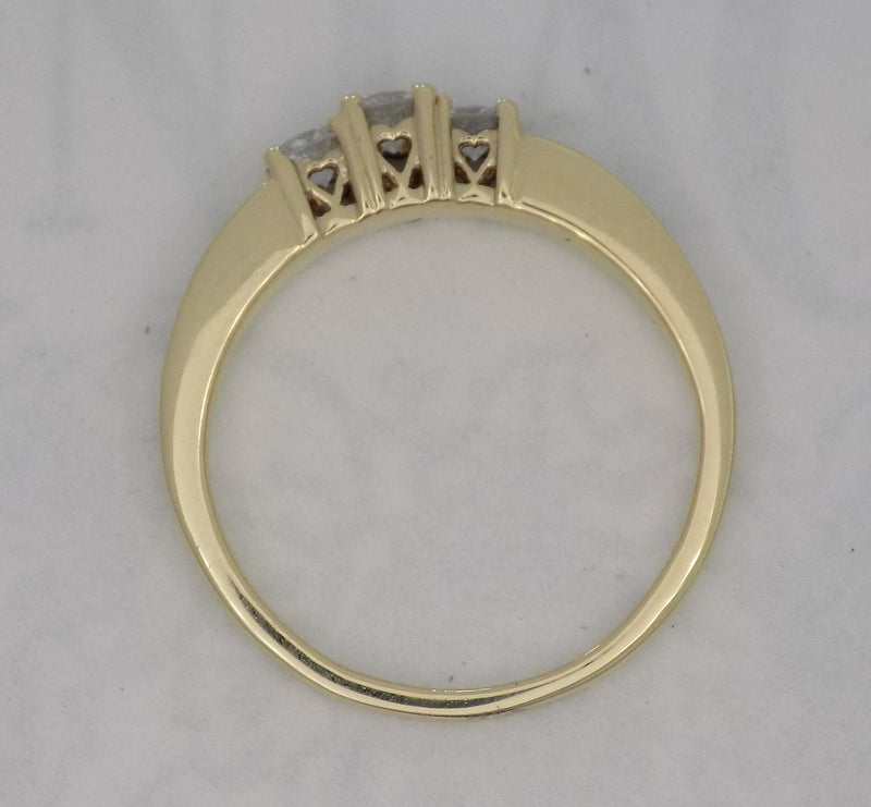 Three stone baguette shank diamond ring.