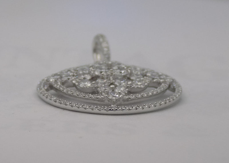 Circular diamond and white gold pendant