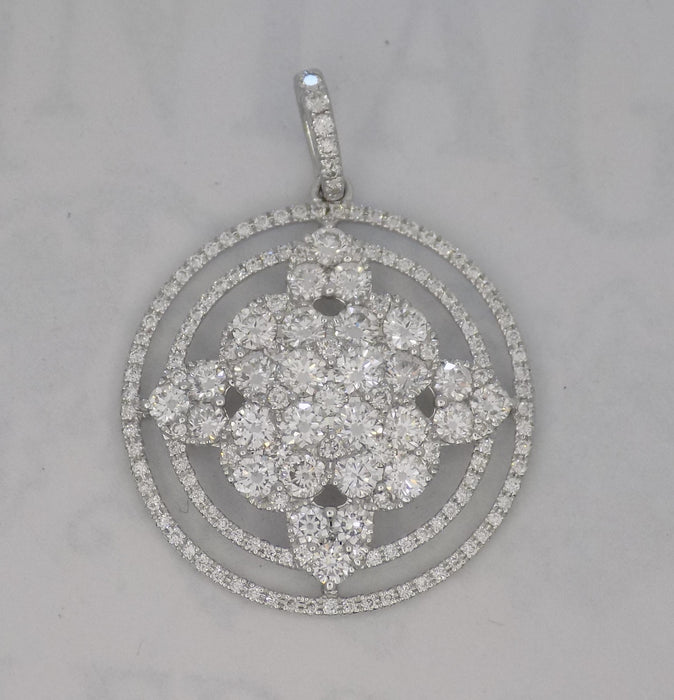 Circular diamond and white gold pendant