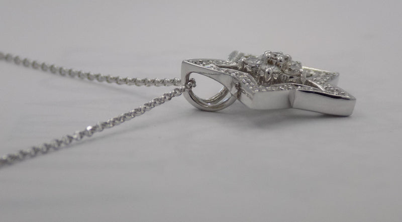 White gold and diamond star pendant