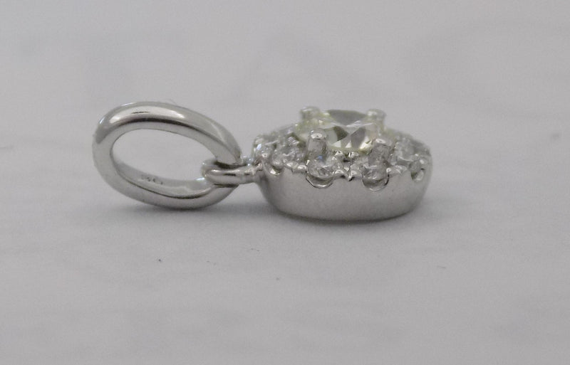 .30 ct 14k white gold diamond cluster pendant.