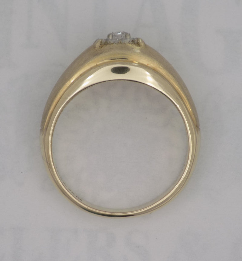 .12 carat two-tone diamond solitaire dome ring.