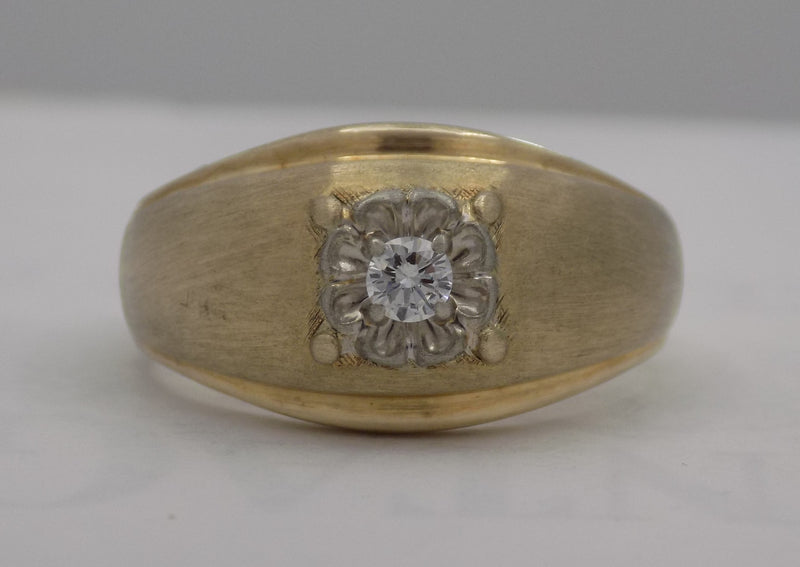 .12 carat two-tone diamond solitaire dome ring.