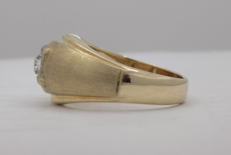 .12 carat two-tone diamond solitaire dome ring.