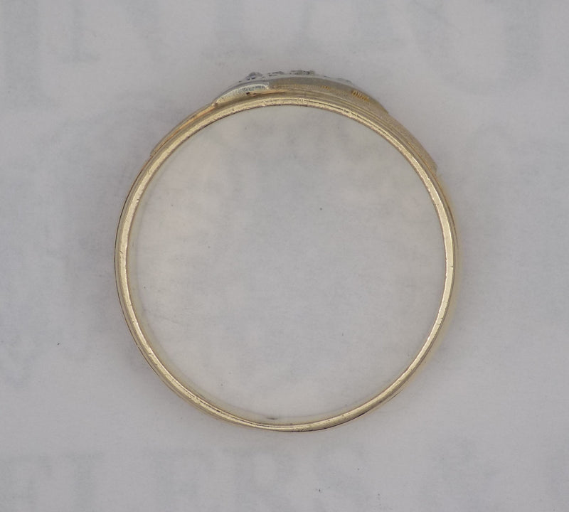 Yellow gold florentine finish diamond band