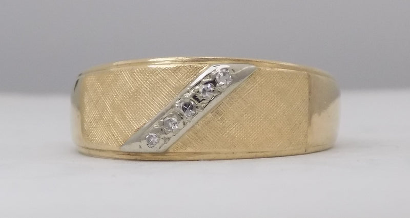 Yellow gold florentine finish diamond band