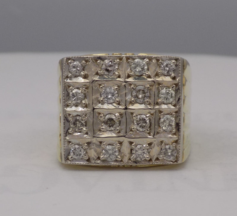 Large square diamond signet ring.