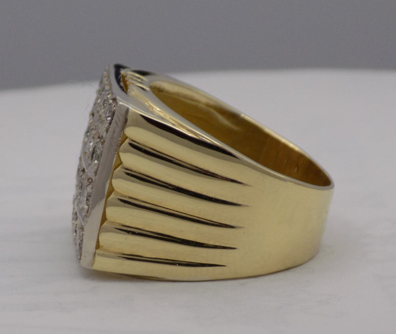 Large square diamond signet ring.