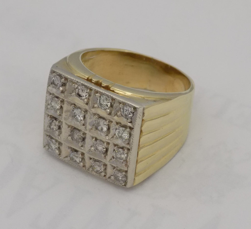 Large square diamond signet ring.