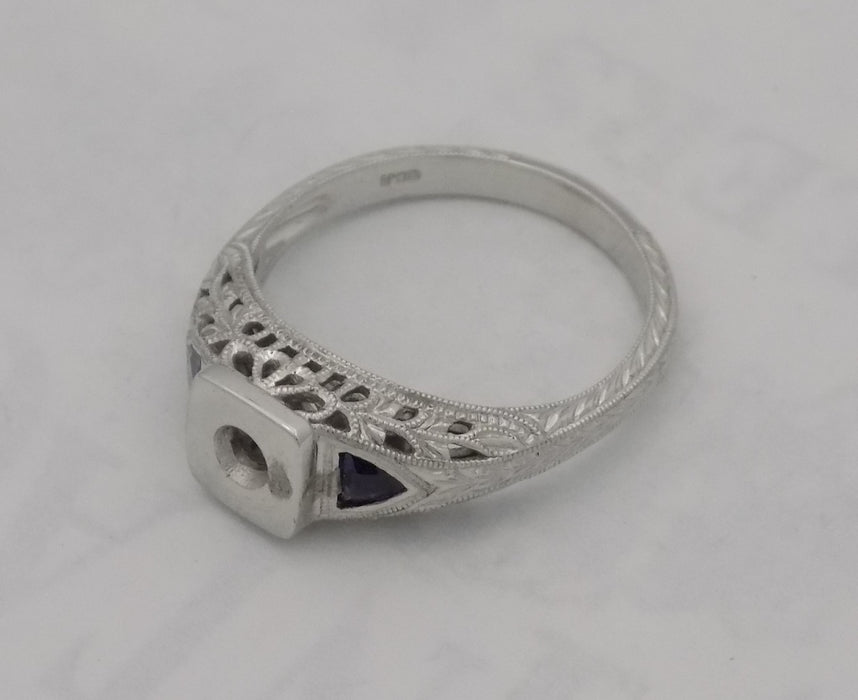 White gold filigree mounting with sapphires