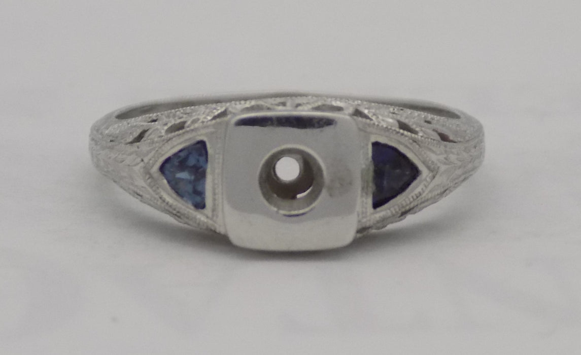 White gold filigree mounting with sapphires