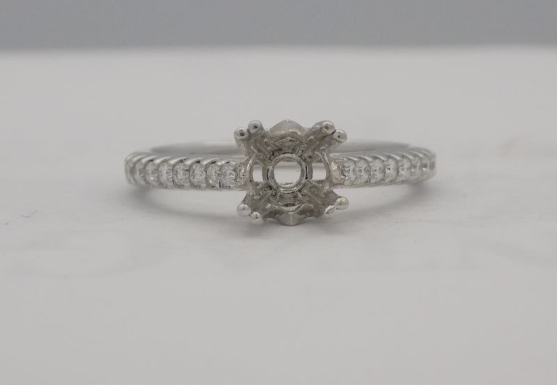 White gold diamond semi mount for a 6 mm stone.