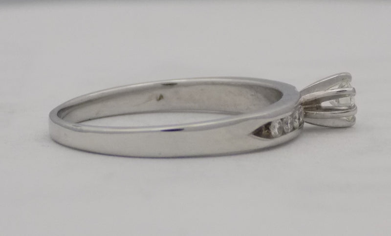White gold diamond channel set band.