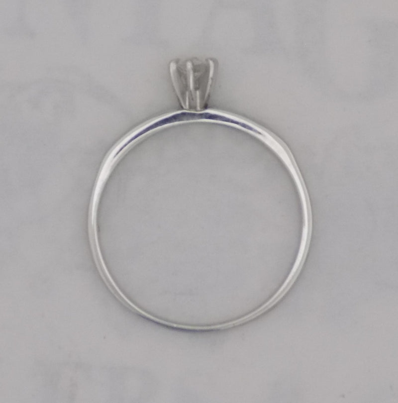 White gold diamond channel set band.