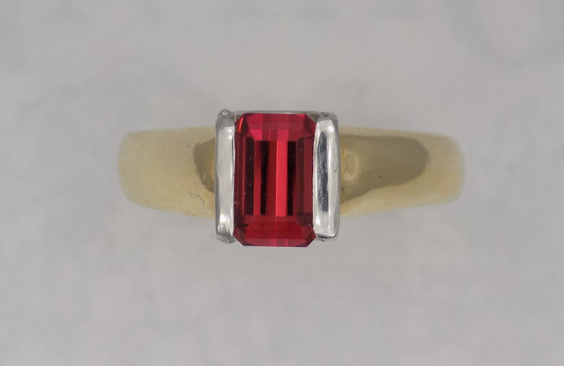 Yellow gold pink tourmaline set in platinum bar set design