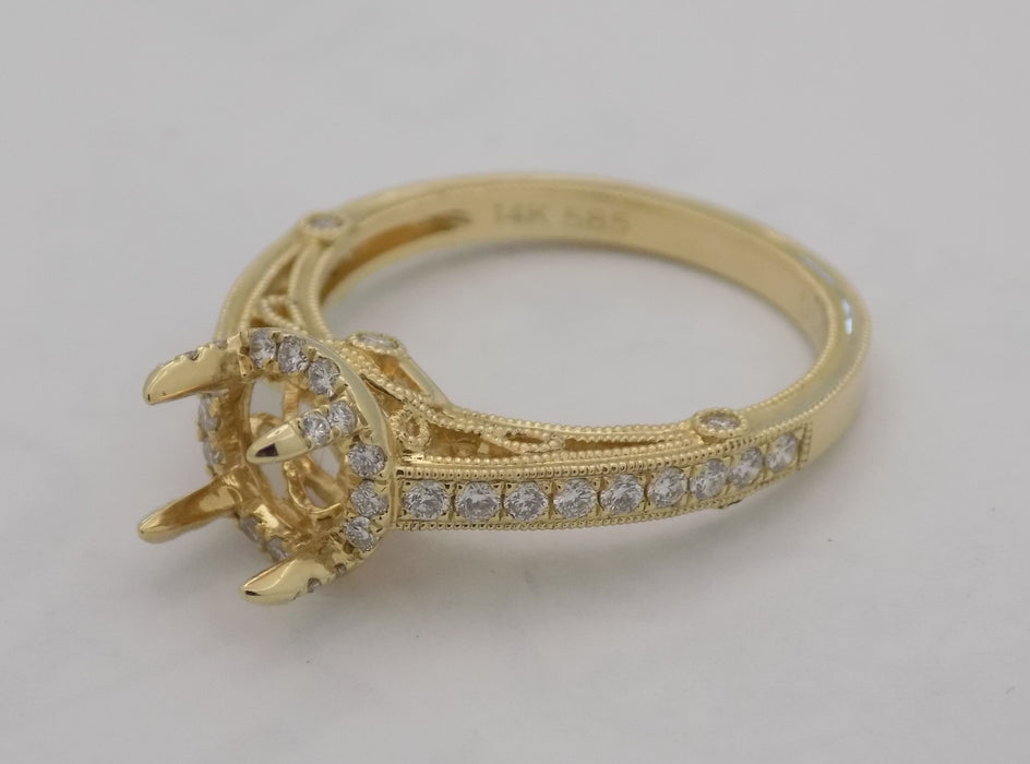Yellow gold curved filigree diamond wedding ring set.