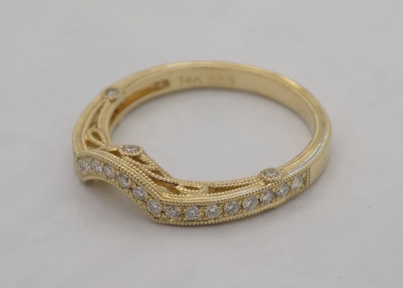 Yellow gold curved filigree diamond wedding ring set.