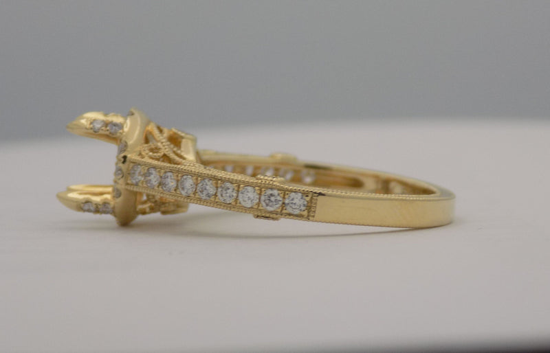Yellow gold curved filigree diamond wedding ring set.