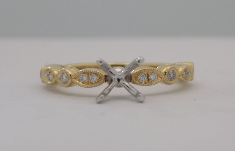 Yellow gold marquise pattern diamond semi-mount engagement ring for 1 carat round diamond