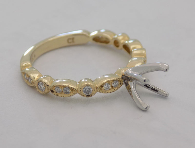 Yellow gold marquise pattern diamond semi-mount engagement ring for 1 carat round diamond