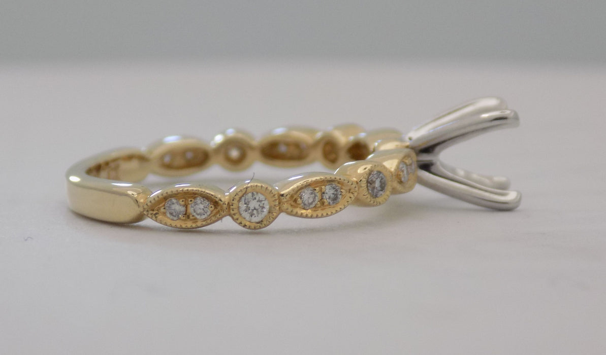 Yellow gold marquise pattern diamond semi-mount engagement ring for 1 carat round diamond
