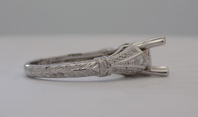 White gold diamond pave' semi-mount for 1.25 carat diamond center stone