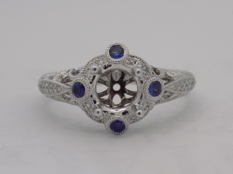 White gold filigree diamond and sapphire halo ring for 1 carat round diamond