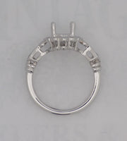 14 karaat white gold diamond semi mount for 1 carat oval diamond.
