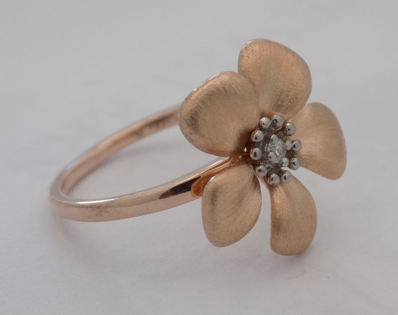 Rose gold floral motif diamond ring