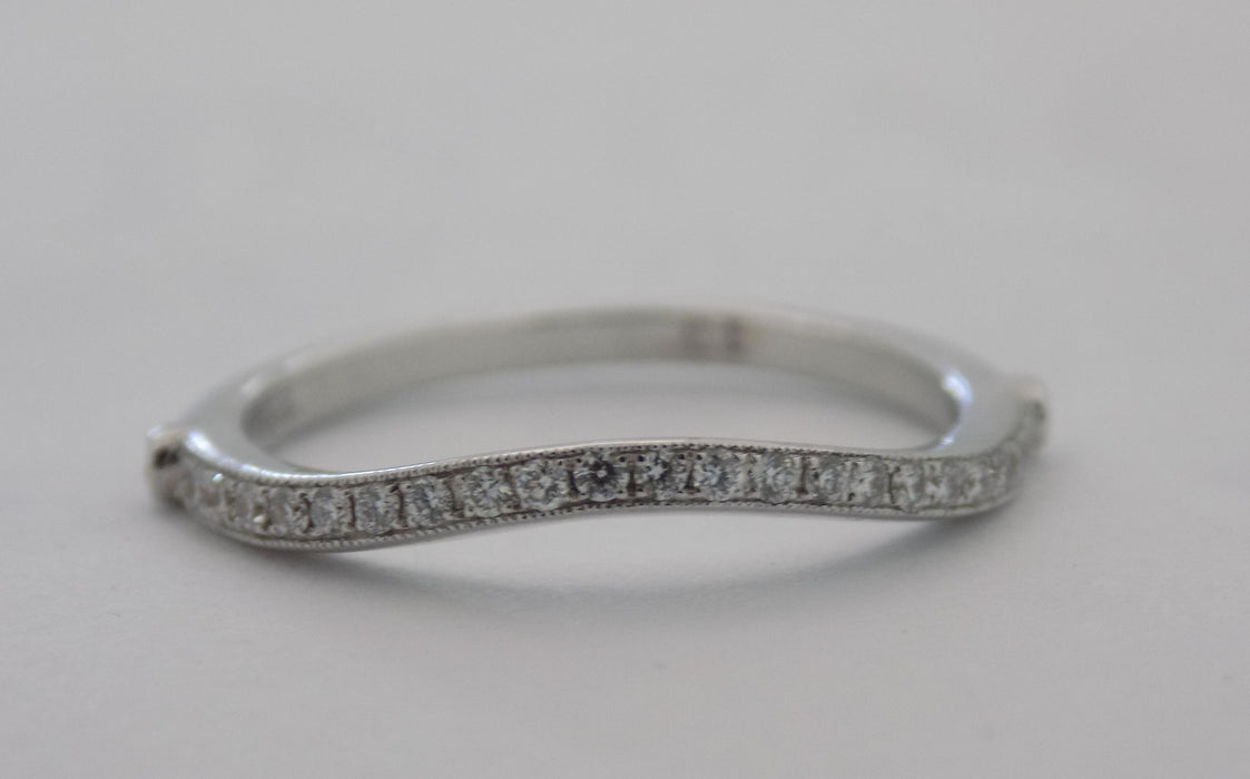 White gold curved pinpoint diamond wedding band