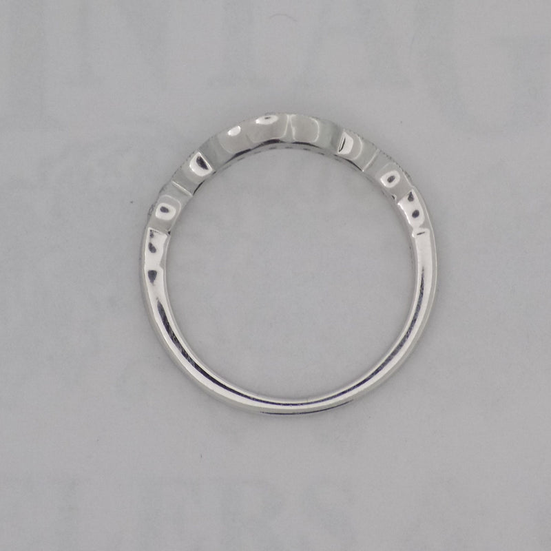 White gold curved diamond wedding band