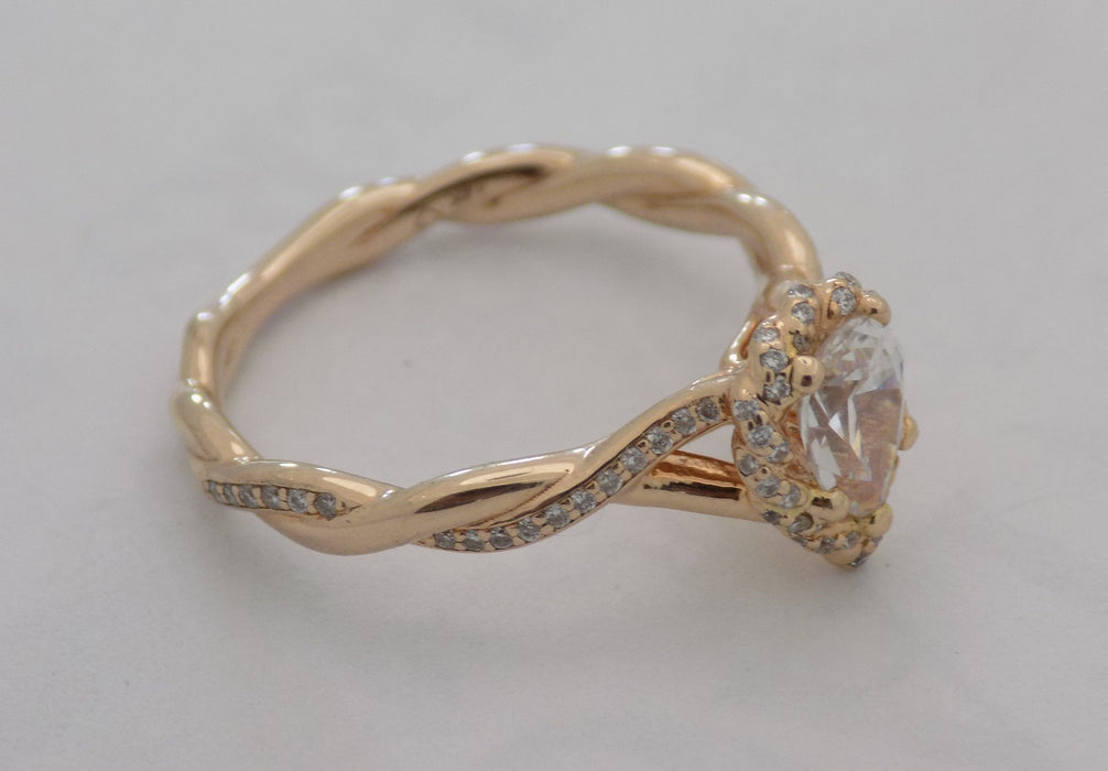 Rose gold diamond twist semi-mount for 1 carat pear shape center