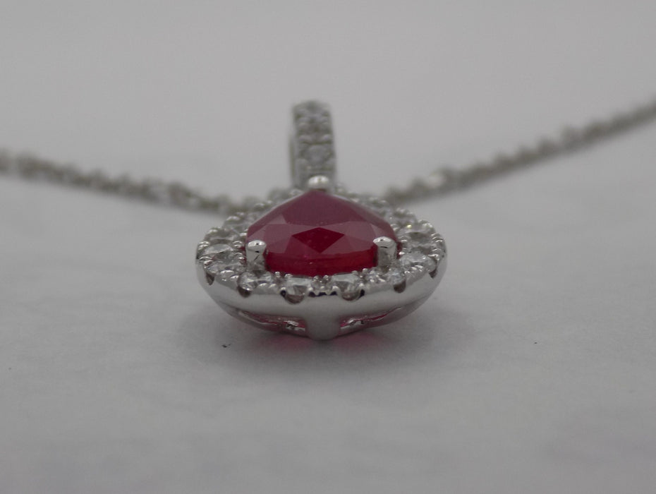 White gold pear shape ruby halo diamond pendant