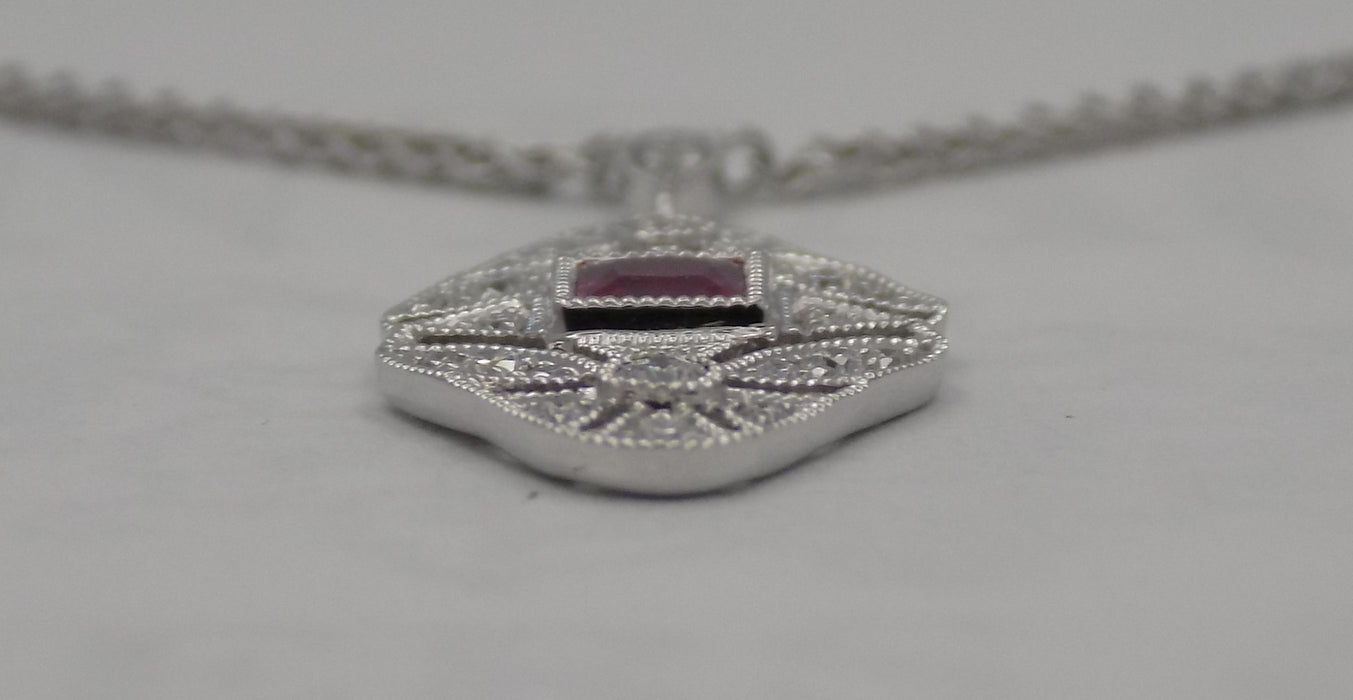 White gold filigree natural ruby pendant with diamond.