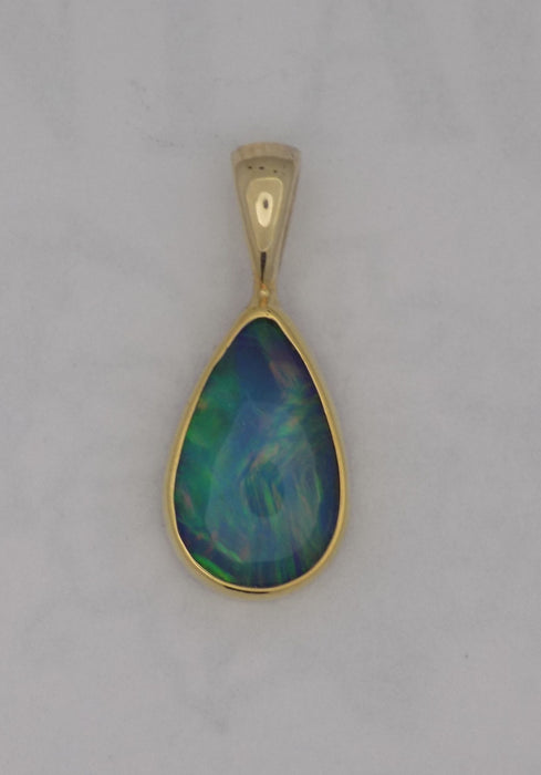 Yellow gold pear shape opal pendant
