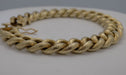 Close up,14 karat yellow gold estate heavy curb link bracelet