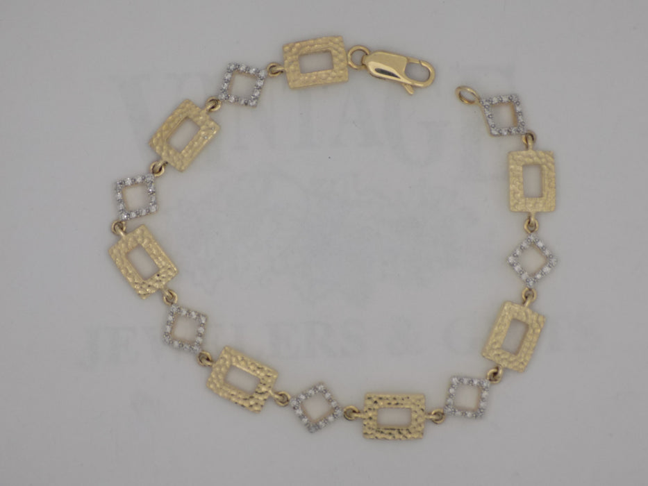 Two tone estate diamond bracelet with gold rectangular links