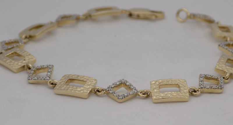 Two tone estate diamond bracelet with gold rectangular links