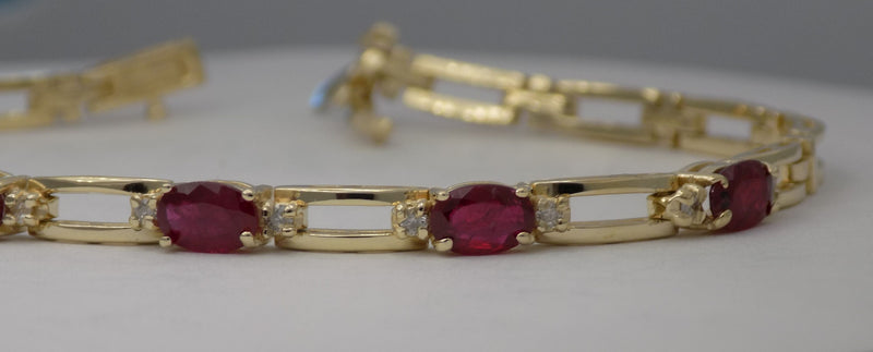 Natural ruby and diamond 14ky gold link bracelet