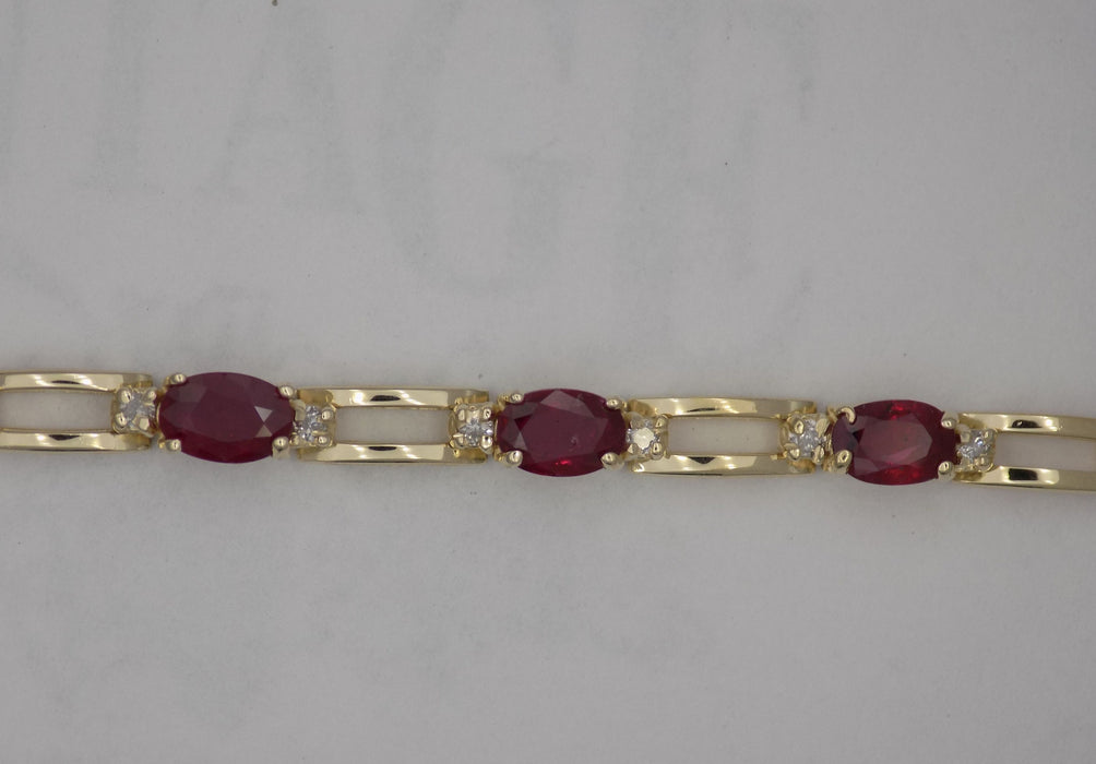 Natural ruby and diamond 14ky gold link bracelet