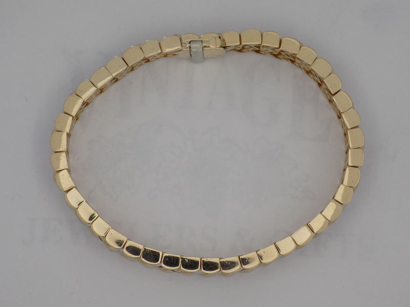 Yellow gold caliber cut natural ruby/diamond bracelet