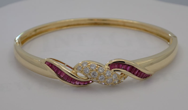 Yellow gold natural rubies and diamond bangle bracelet