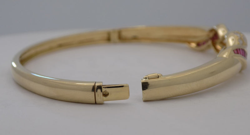 Yellow gold natural rubies and diamond bangle bracelet