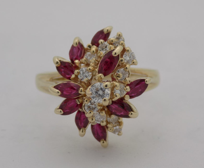 Yellow gold natural ruby diamond cluster ring.
