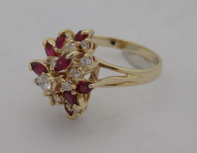 Yellow gold natural ruby diamond cluster ring.