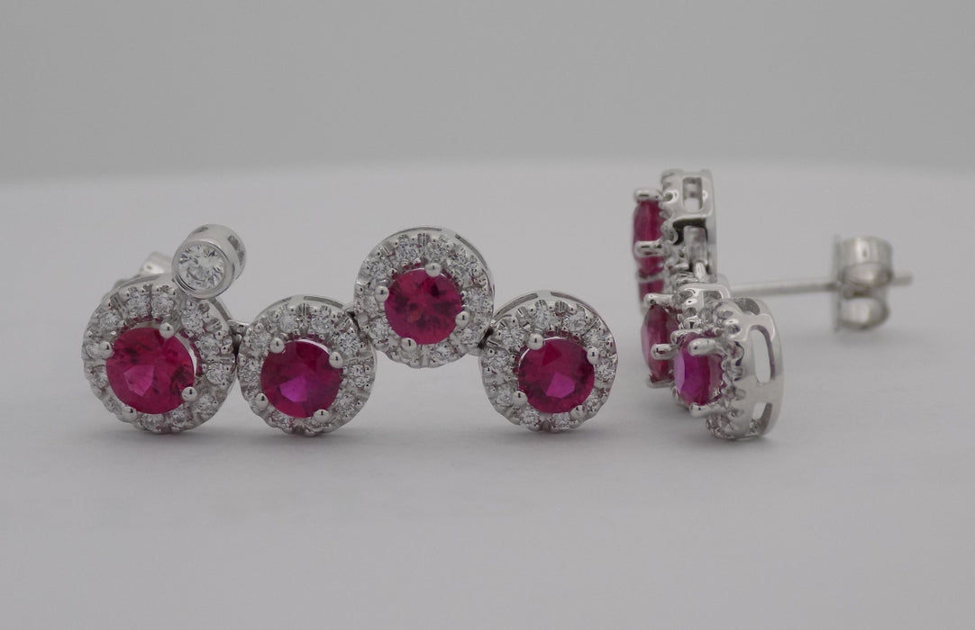 White gold natural ruby with halo diamond drop earrings.