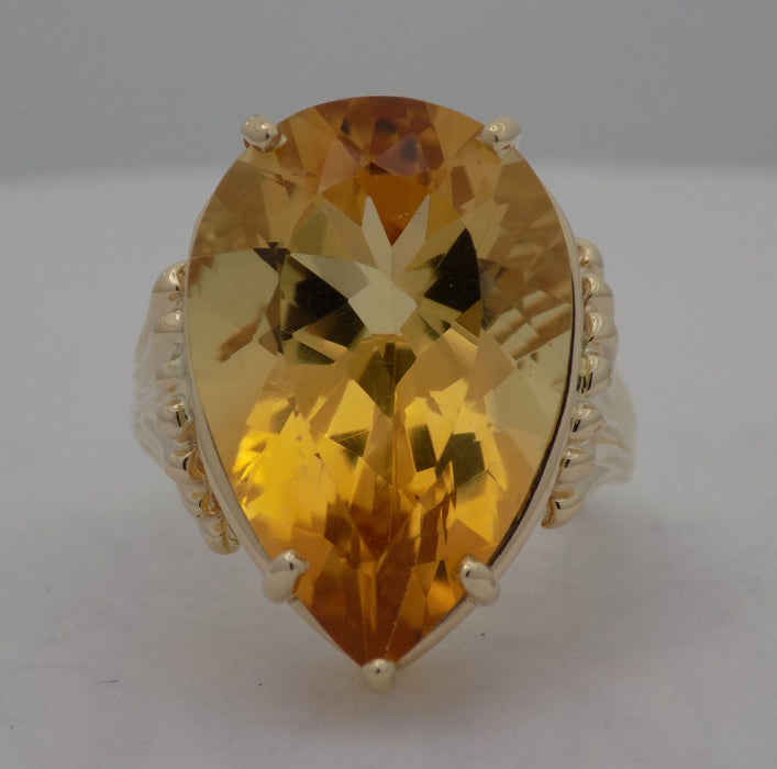 Yellow gold pear shape citrine ring.